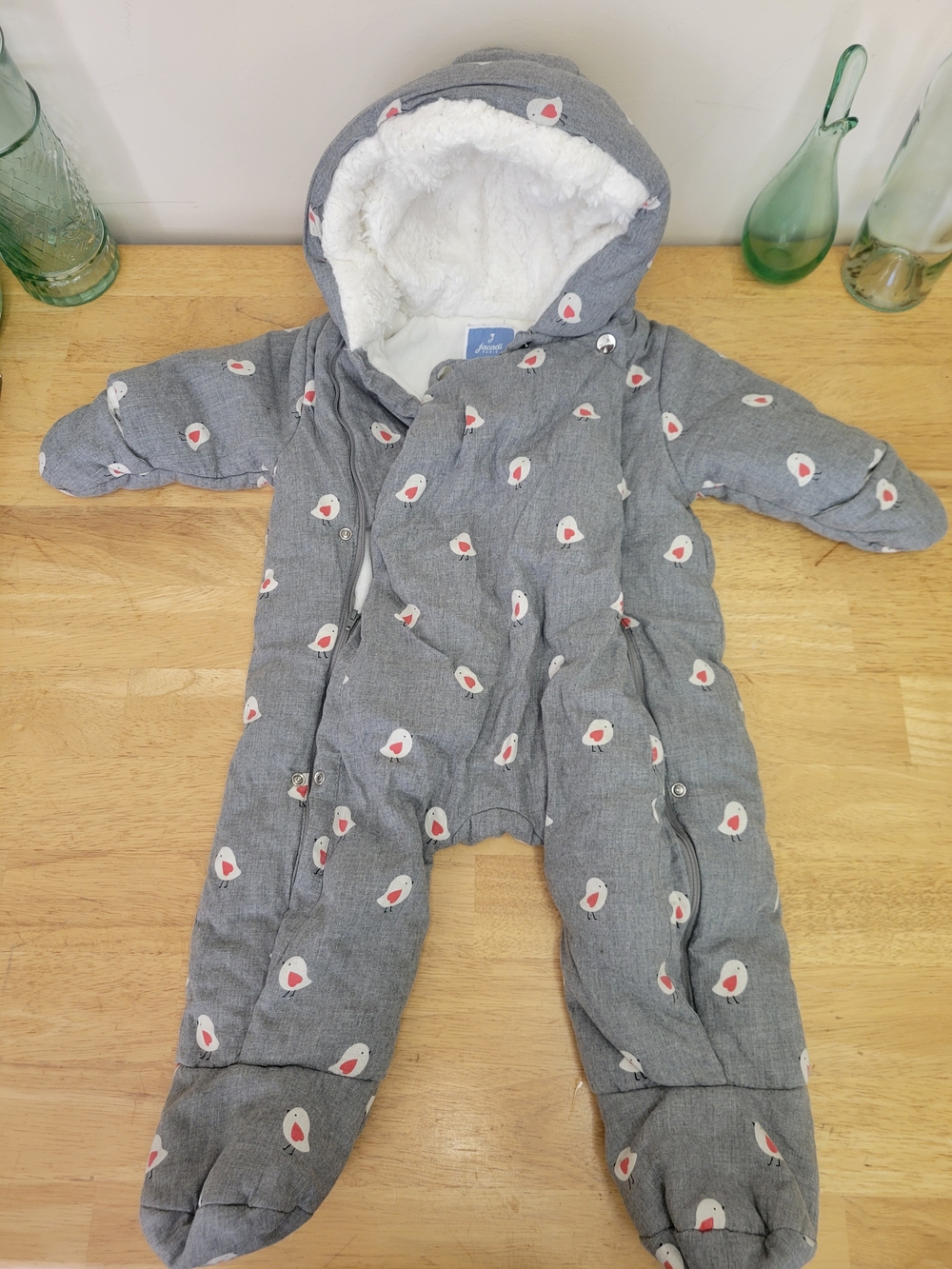 Gray Jacadi Paris infant snowsuit featuring a red and white bird pattern 12m